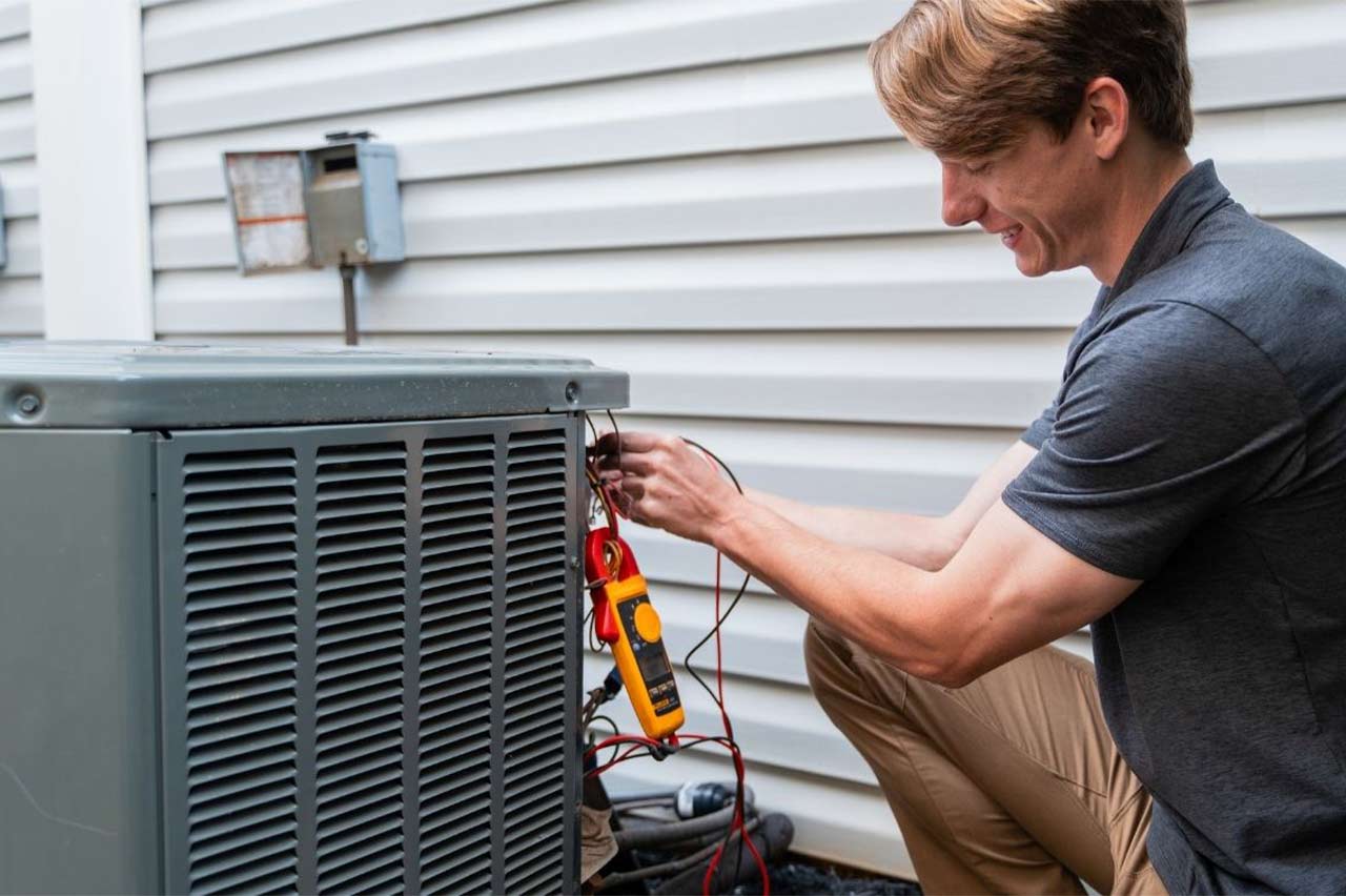 a professional installing a new HVAC system